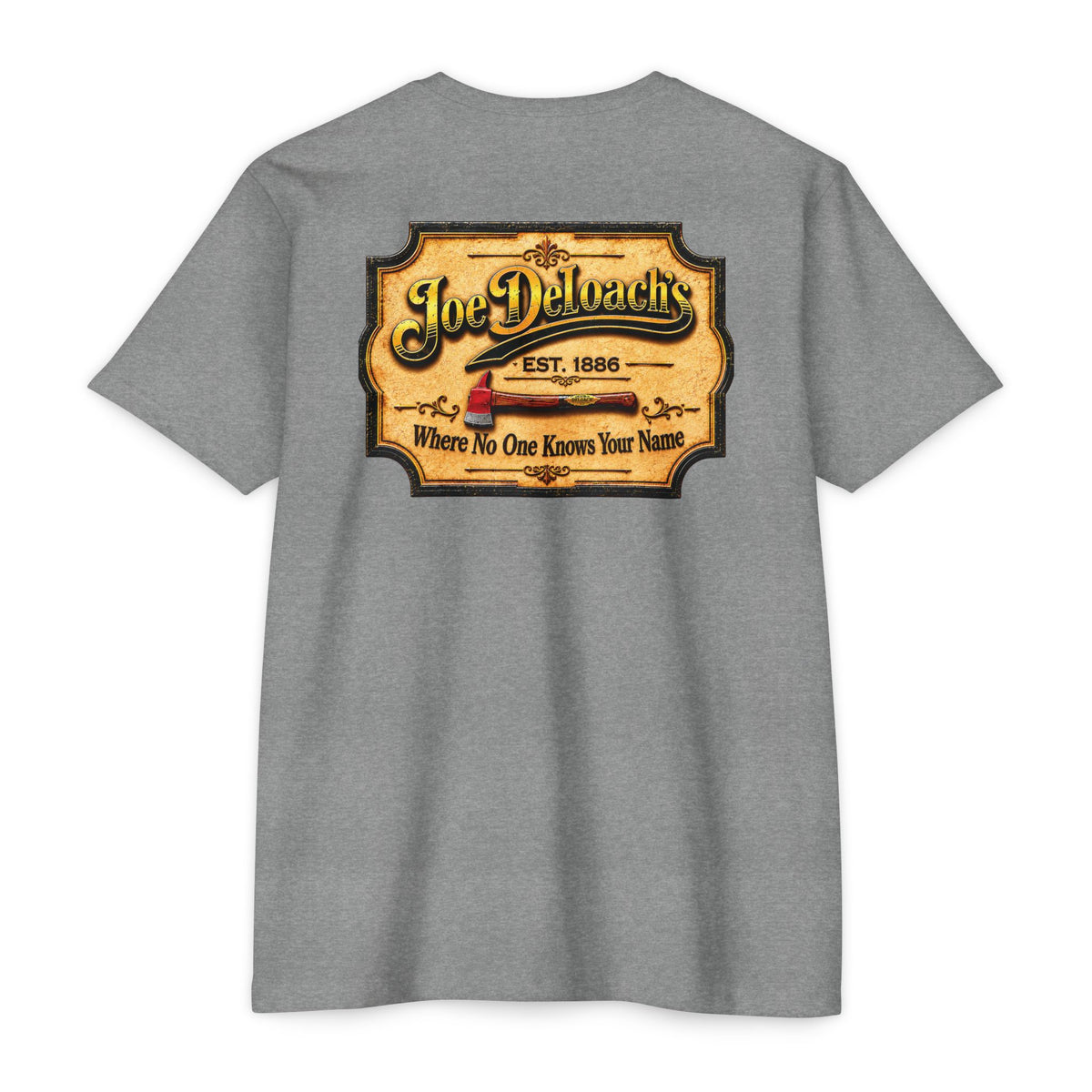 A heather gray short-sleeve t-shirt shown from the back, featuring a large vintage-style graphic print on the upper back. The graphic is styled like a wooden sign with the text 'Joe Deloachy's' and 'Where No One Knows Your Name' in black lettering, with a rifle and a red revolver illustration in the center.