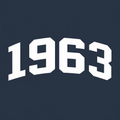 White varsity-style '1963' lettering centered on a dark navy background.