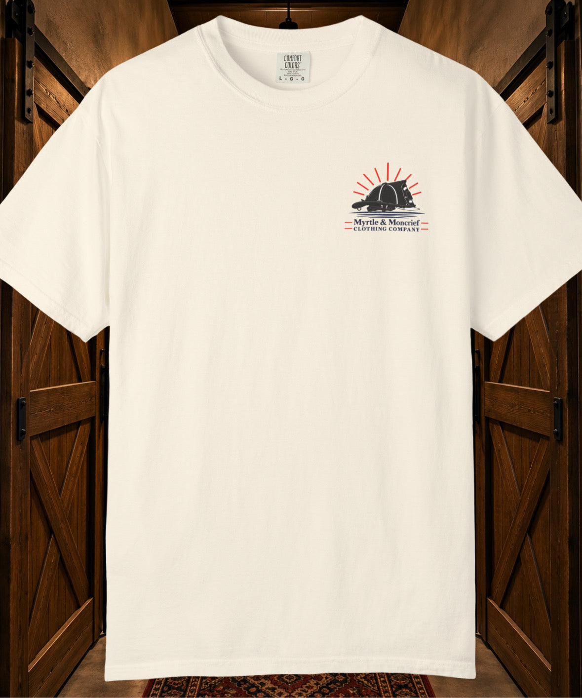 An off-white short-sleeve t-shirt with a small chest graphic, hanging against a rustic dark wood background.