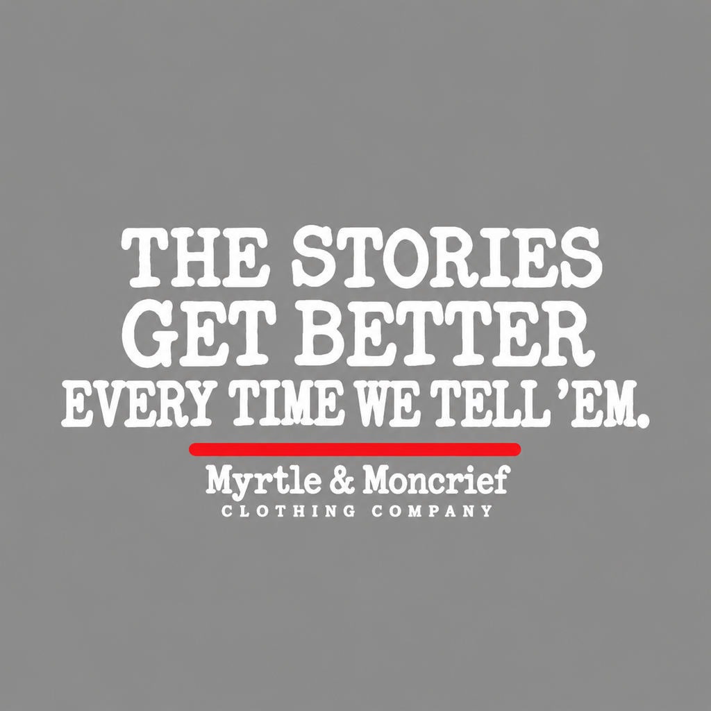 Back graphic close-up: White lettering reading “The Stories Get Better Every Time We Tell ’Em,” with a red underline and Myrtle & Moncrief Clothing Company branding.